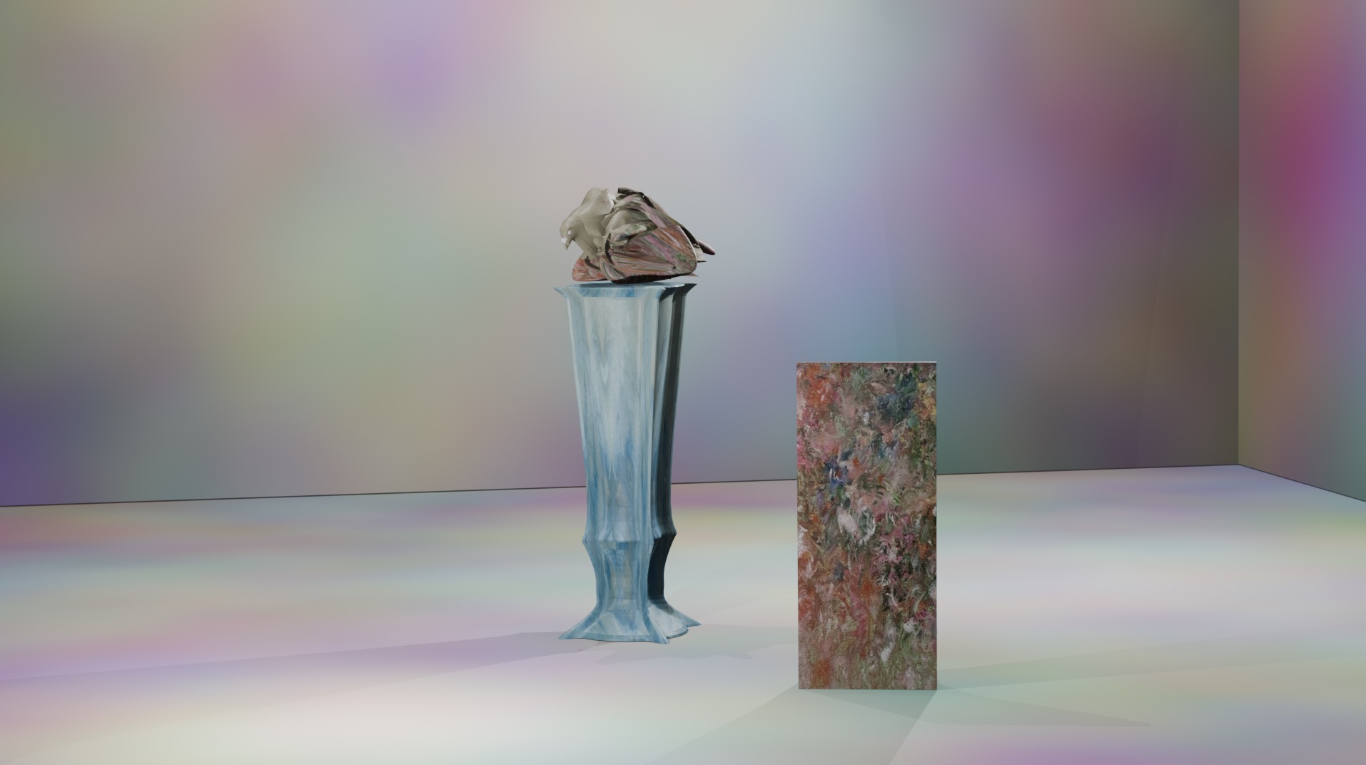 Blender sculpture on a blue pedestal beside a textured block in a softly colored room